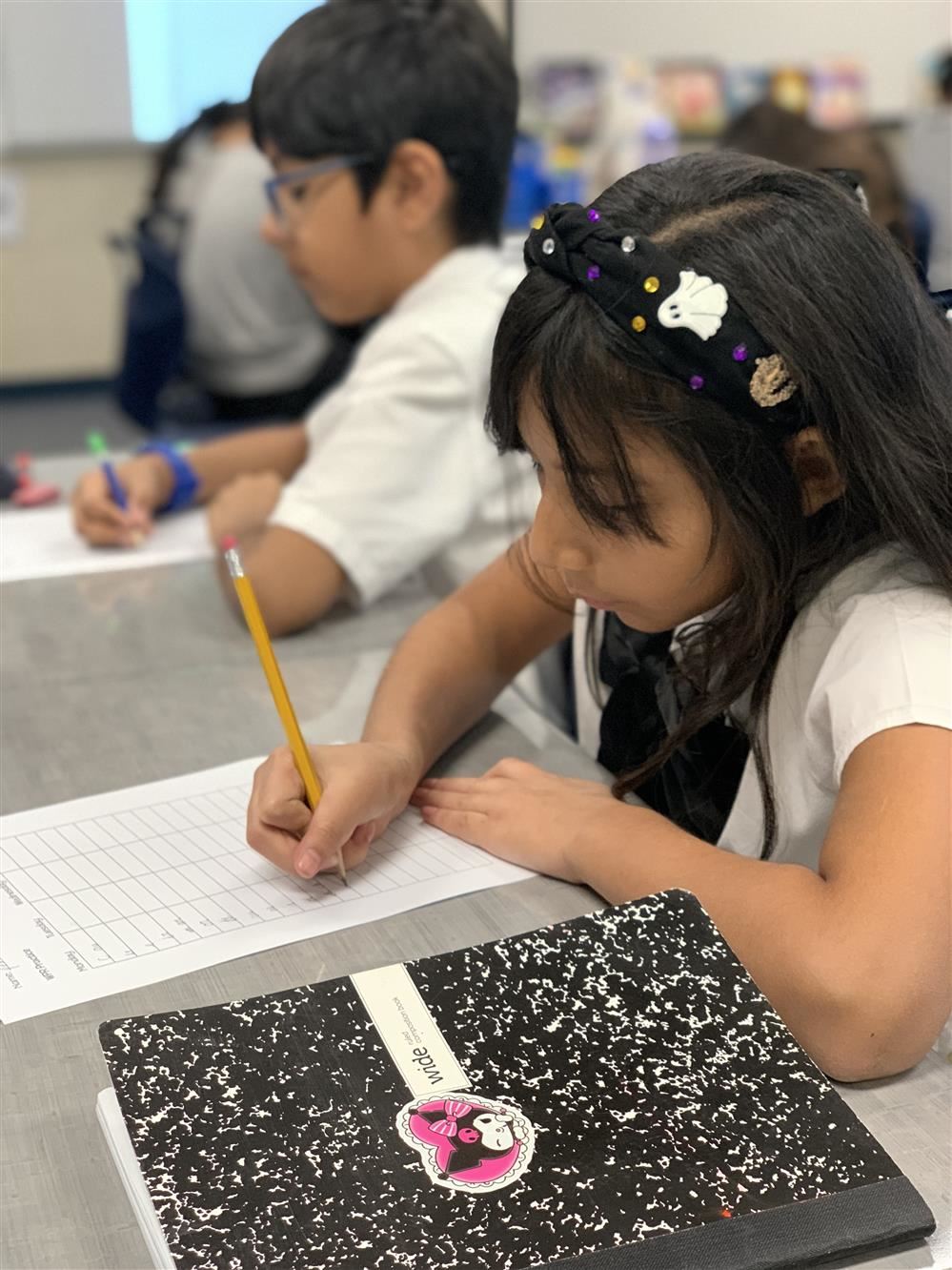 Two students writing