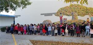 Kindergarten Student Sing Holiday Songs 