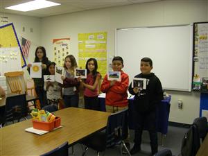 Green Club students show energy cards 