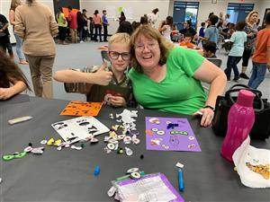 Families get creative at pumpkin night. 